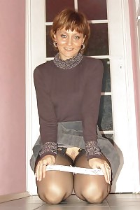 Kirsty Brightly Strips Her Satin Underwear Exposing Her Hairy Pussy