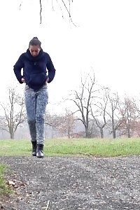 Enticing Brunette Just Can Not Stop Peeing Outside