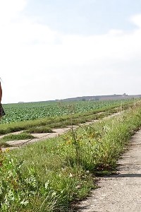 Naughty Blonde Peeing Over The Ground Outside
