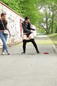 Smashing Amateurs Piss Together On A Path In City